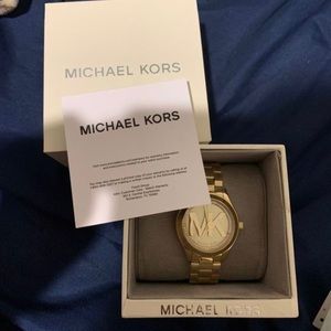Gold MK watch